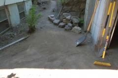 Concrete in front of garage